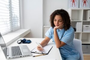 Academic editor formatting a research manuscript to journal guidelines, ensuring proper citations, headings, and reference lists for APA, MLA, or IEEE styles.